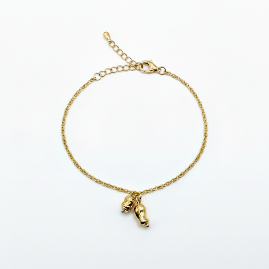 Bracciale Charm Dorato - sfondo bianco puro senza ombre